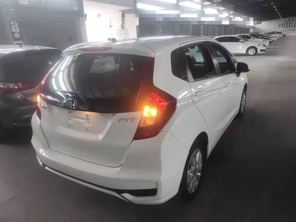 Honda Fit — фото 7