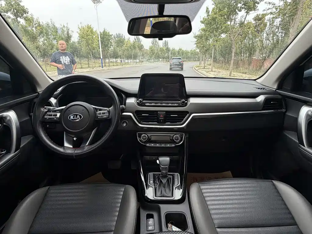 Kia Sportage — фото 11