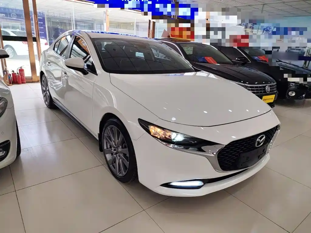 Mazda 3 Axela — фото 4