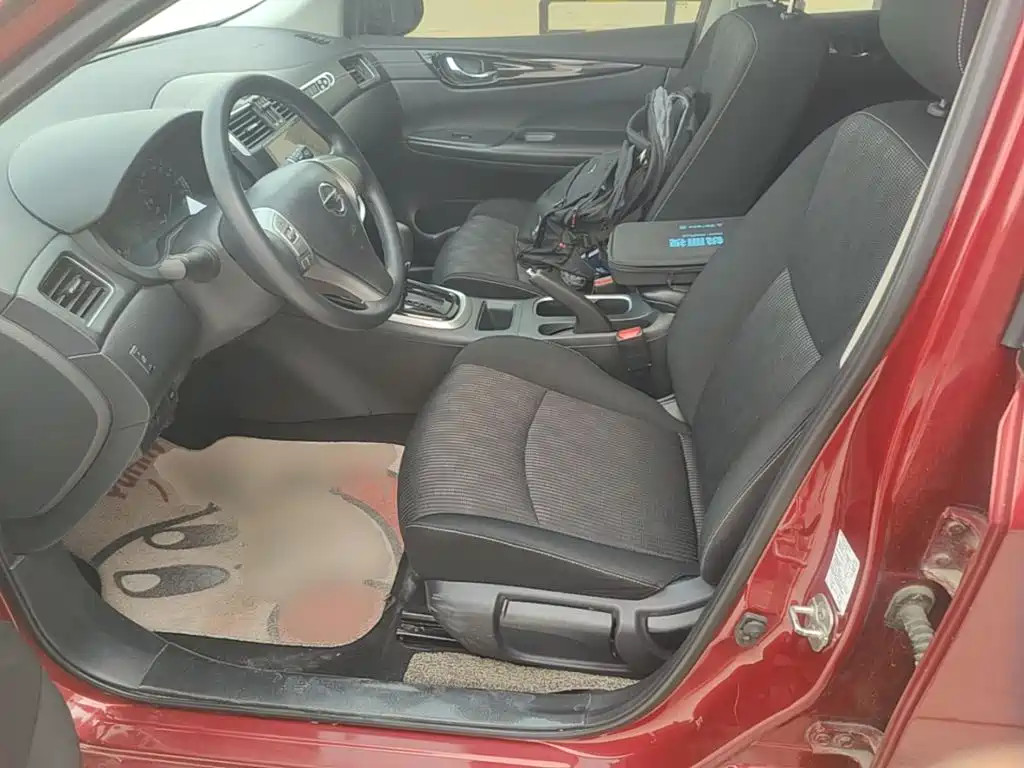 Nissan Tiida — фото 15