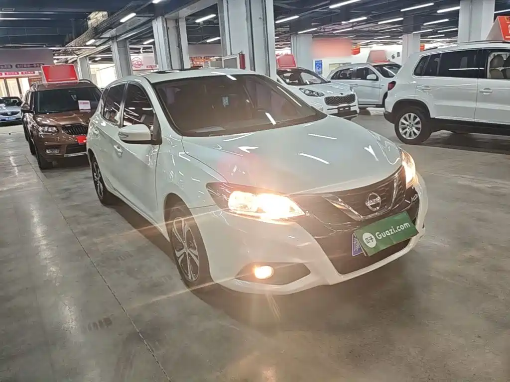 Nissan Tiida — фото 4