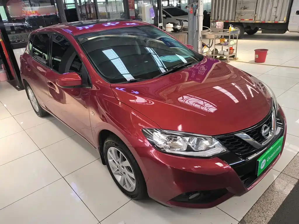 Nissan Tiida — фото 4