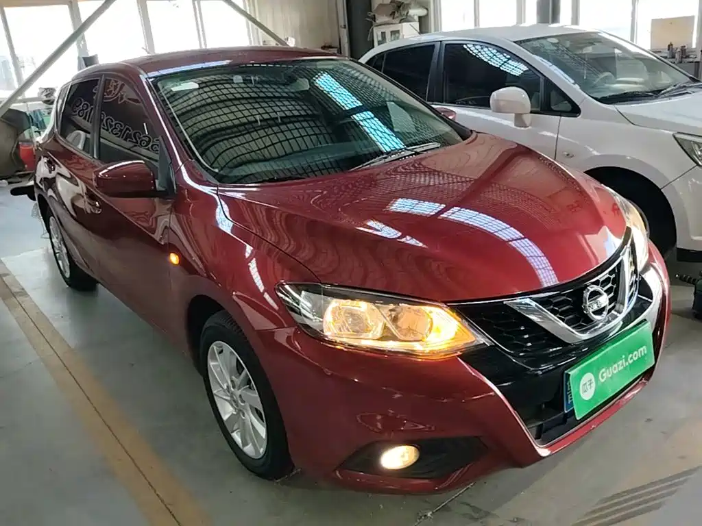 Nissan Tiida — фото 4