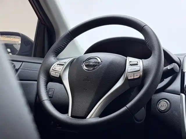 Nissan Tiida — фото 7