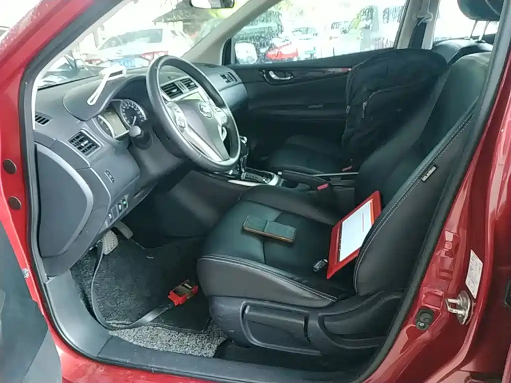 Nissan Tiida — фото 13