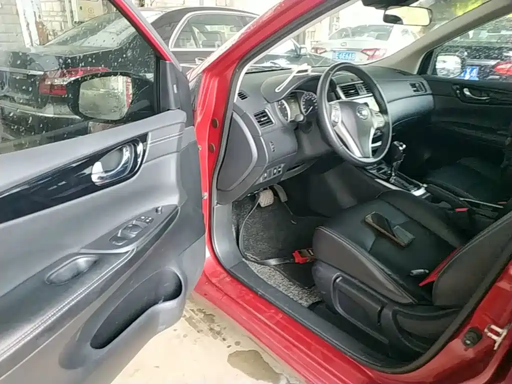 Nissan Tiida — фото 14