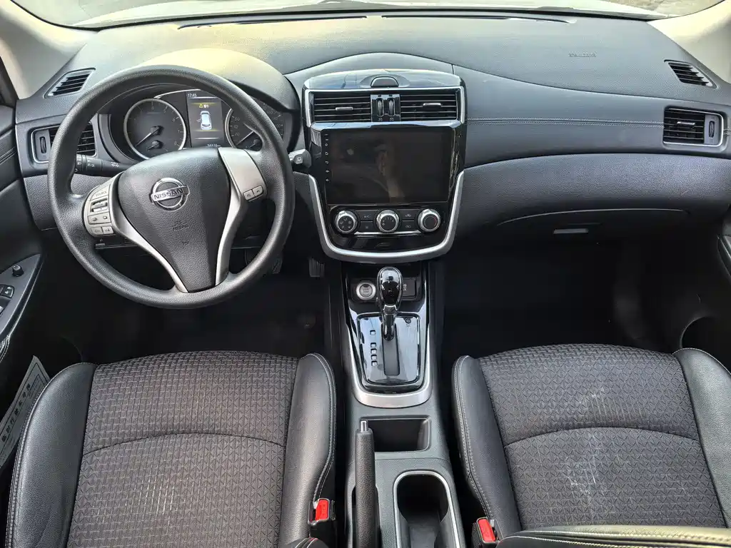 Nissan Tiida — фото 9