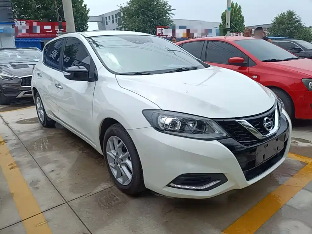 Nissan Tiida — фото 22