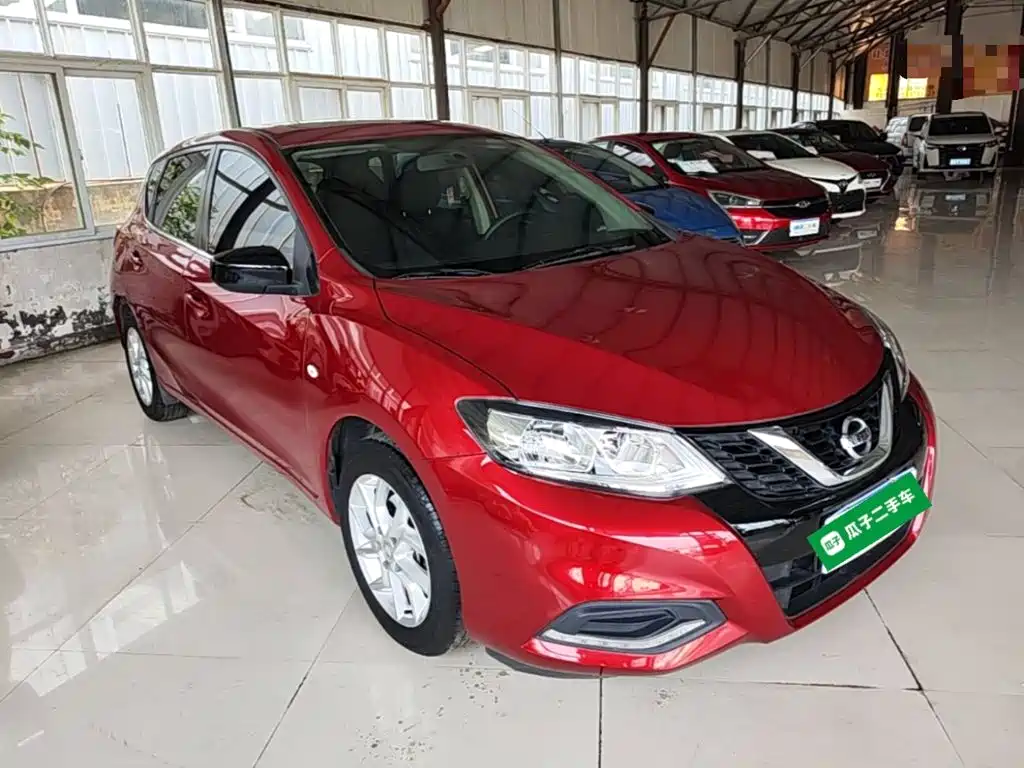 Nissan Tiida — фото 4