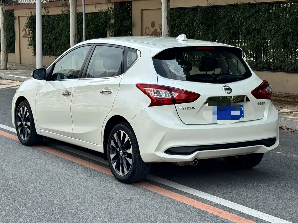 Nissan Tiida — фото 8