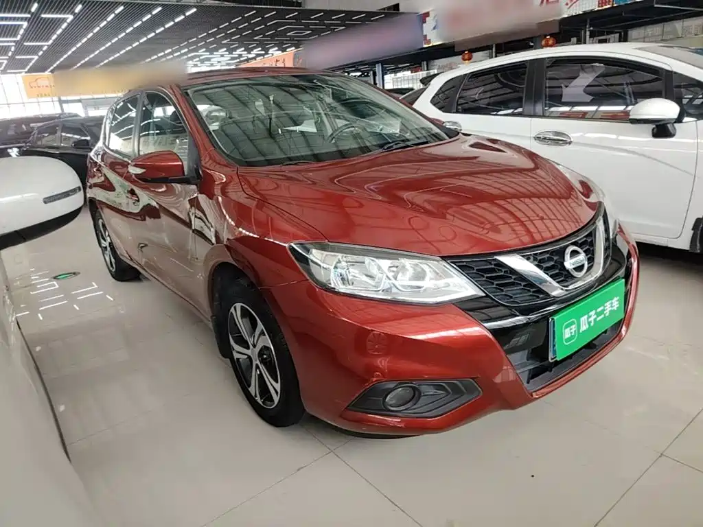 Nissan Tiida — фото 4