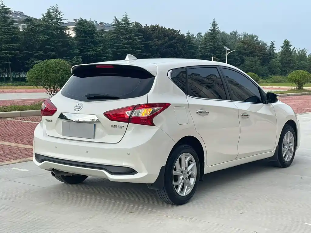 Nissan Tiida — фото 7