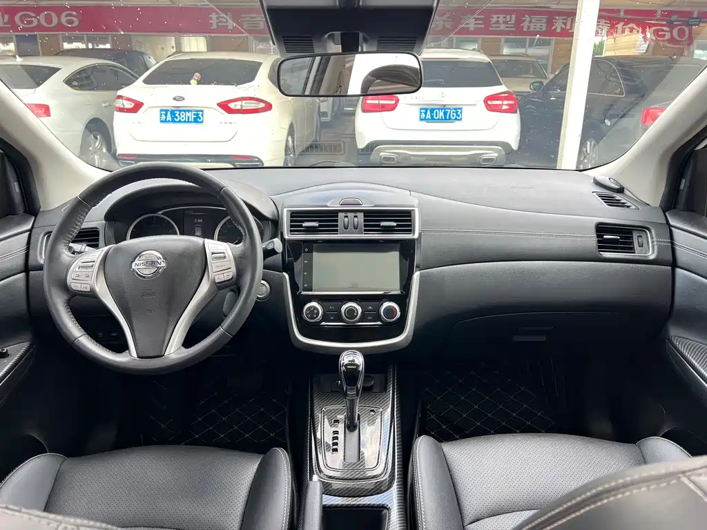 Nissan Tiida — фото 15