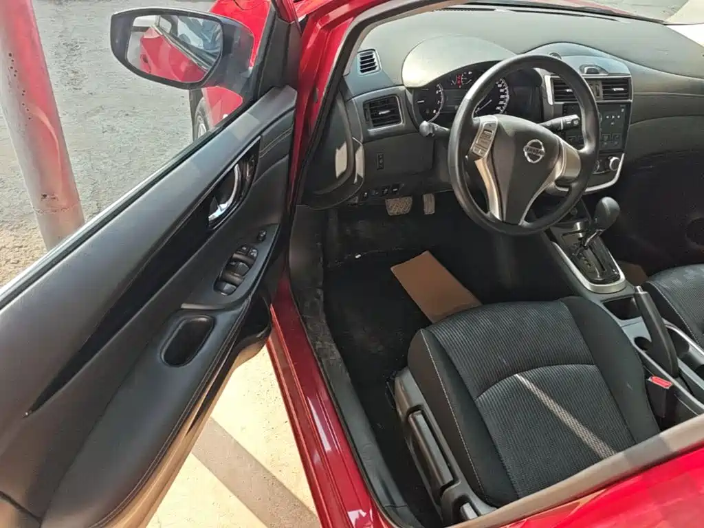 Nissan Tiida — фото 16