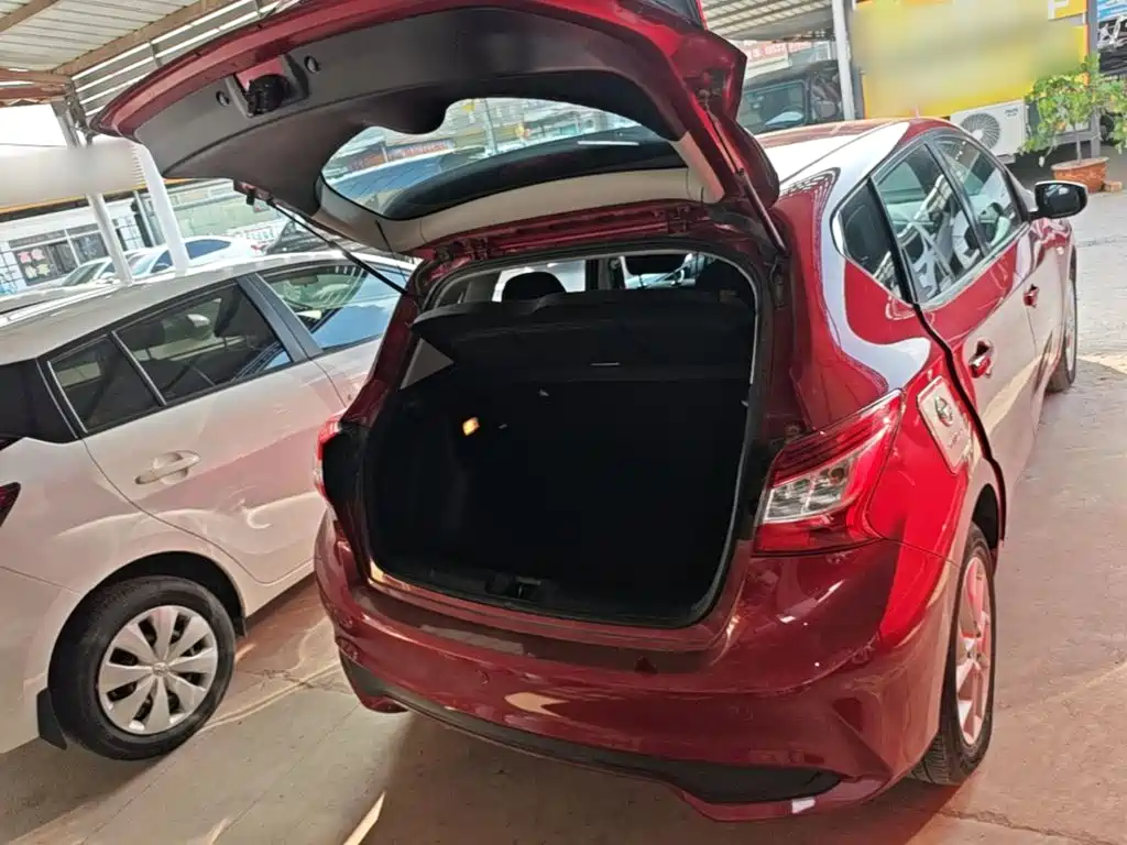 Nissan Tiida — фото 19
