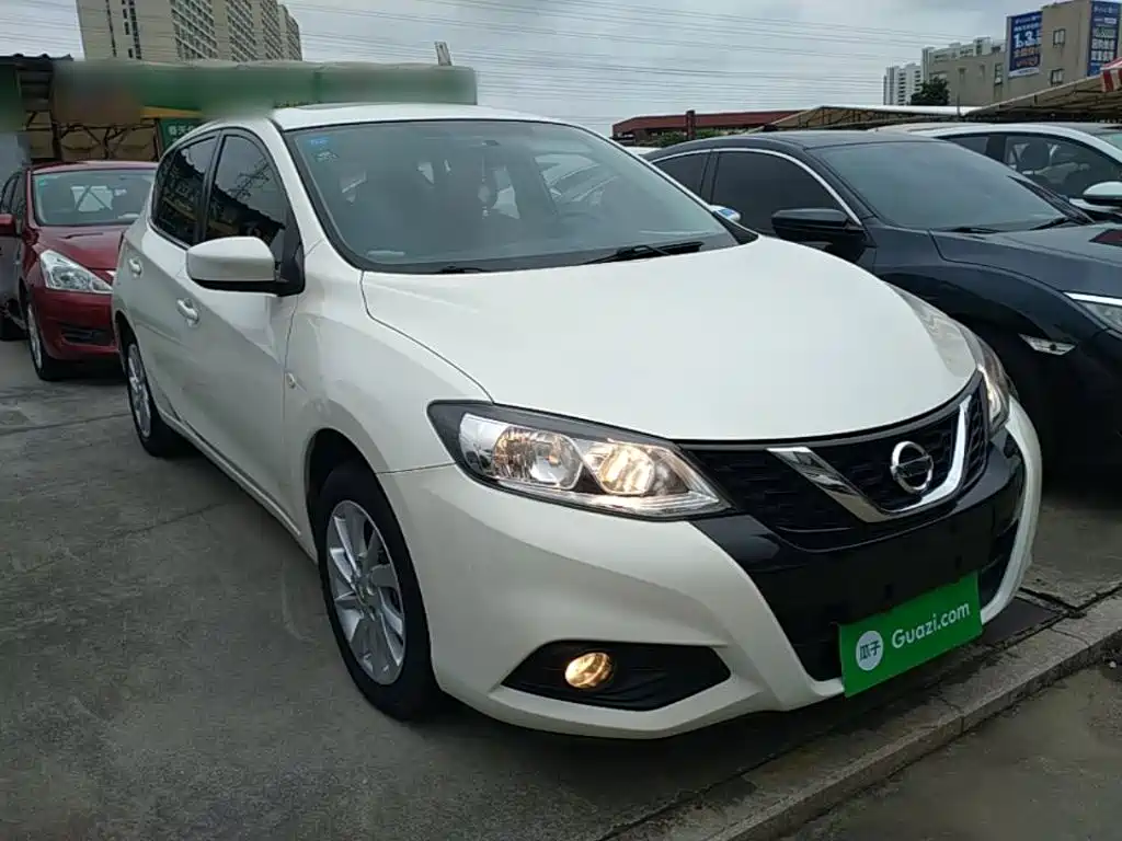 Nissan Tiida — фото 4