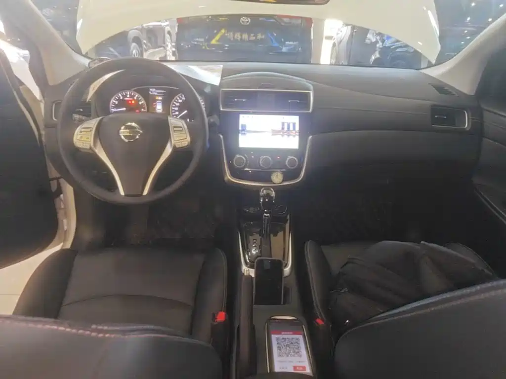 Nissan Tiida — фото 10