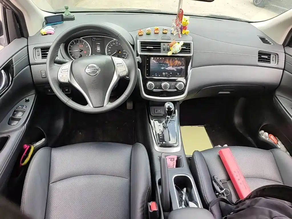 Nissan Tiida — фото 10