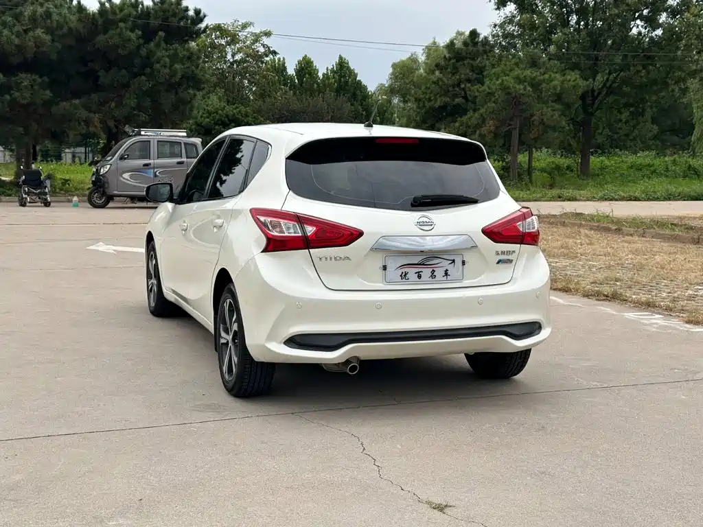 Nissan Tiida — фото 4