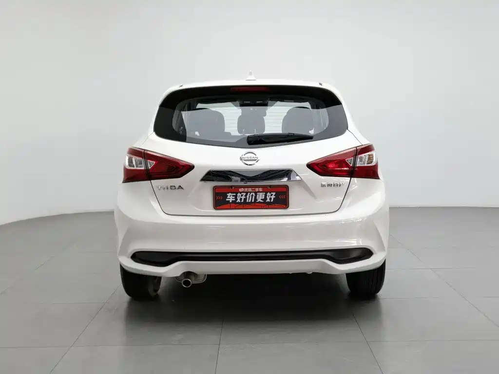 Nissan Tiida — фото 4