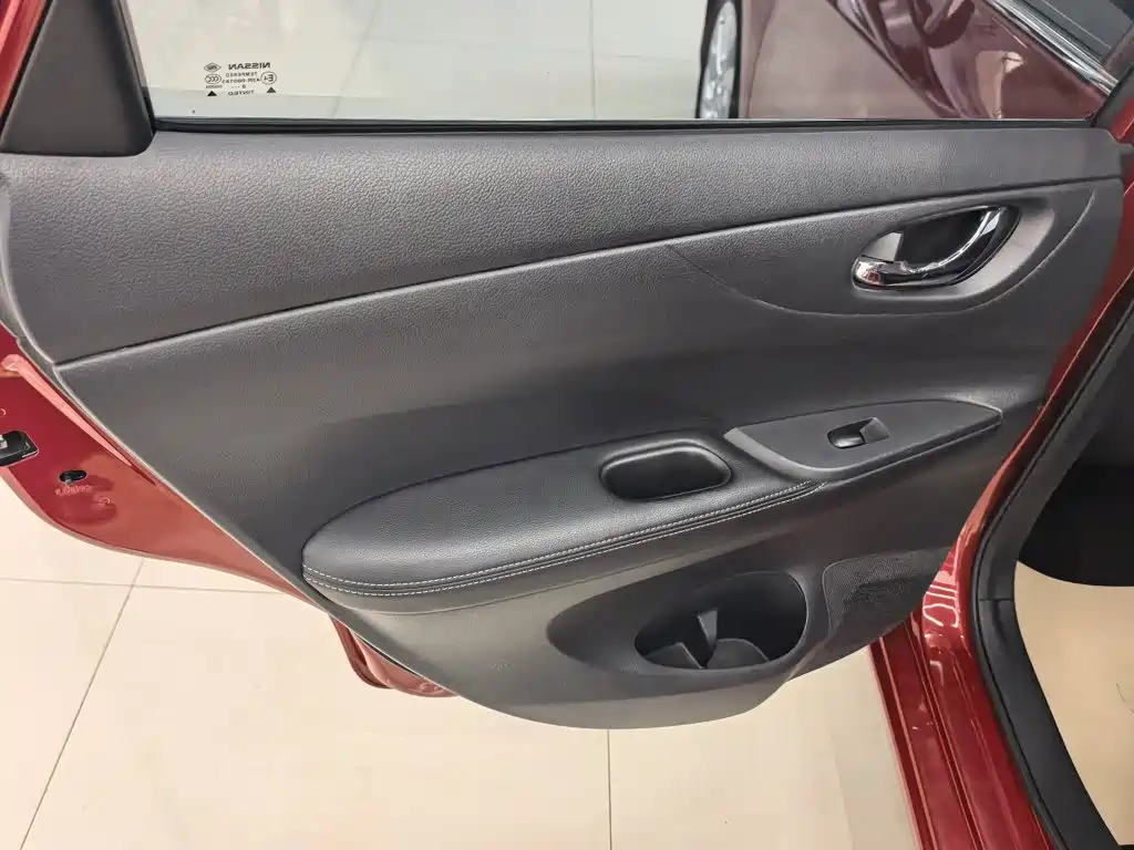 Nissan Tiida — фото 9