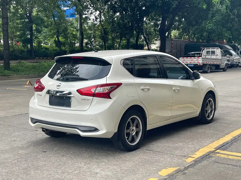 Nissan Tiida — фото 15