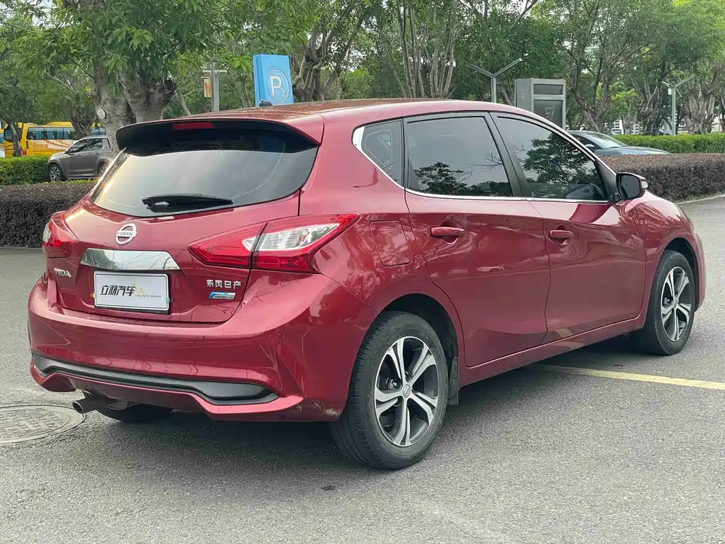 Nissan Tiida — фото 12