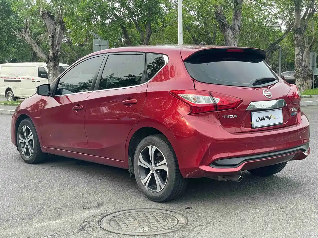 Nissan Tiida — фото 10