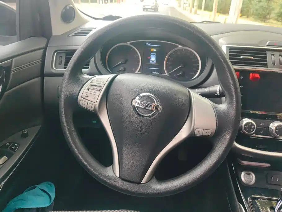 Nissan Tiida — фото 15