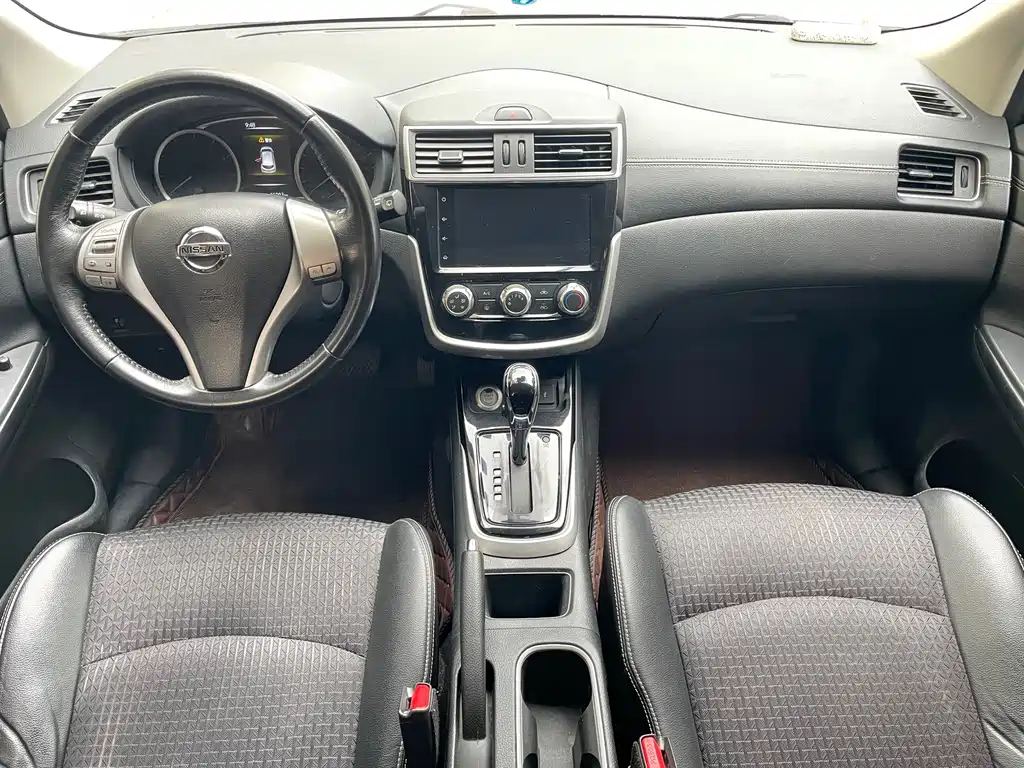 Nissan Tiida — фото 7