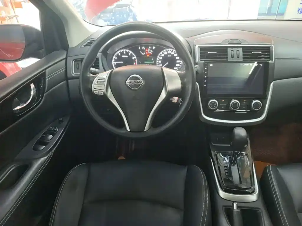 Nissan Tiida — фото 11