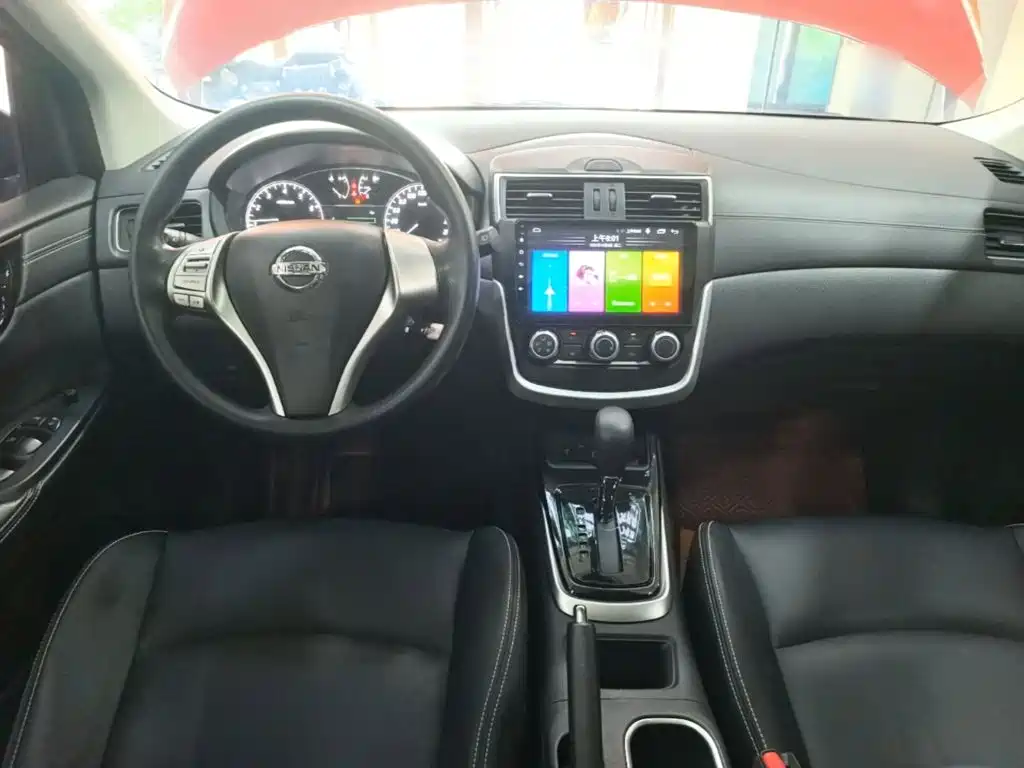 Nissan Tiida — фото 10