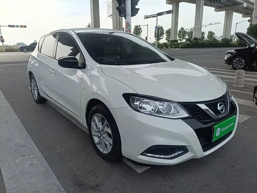 Nissan Tiida — фото 4