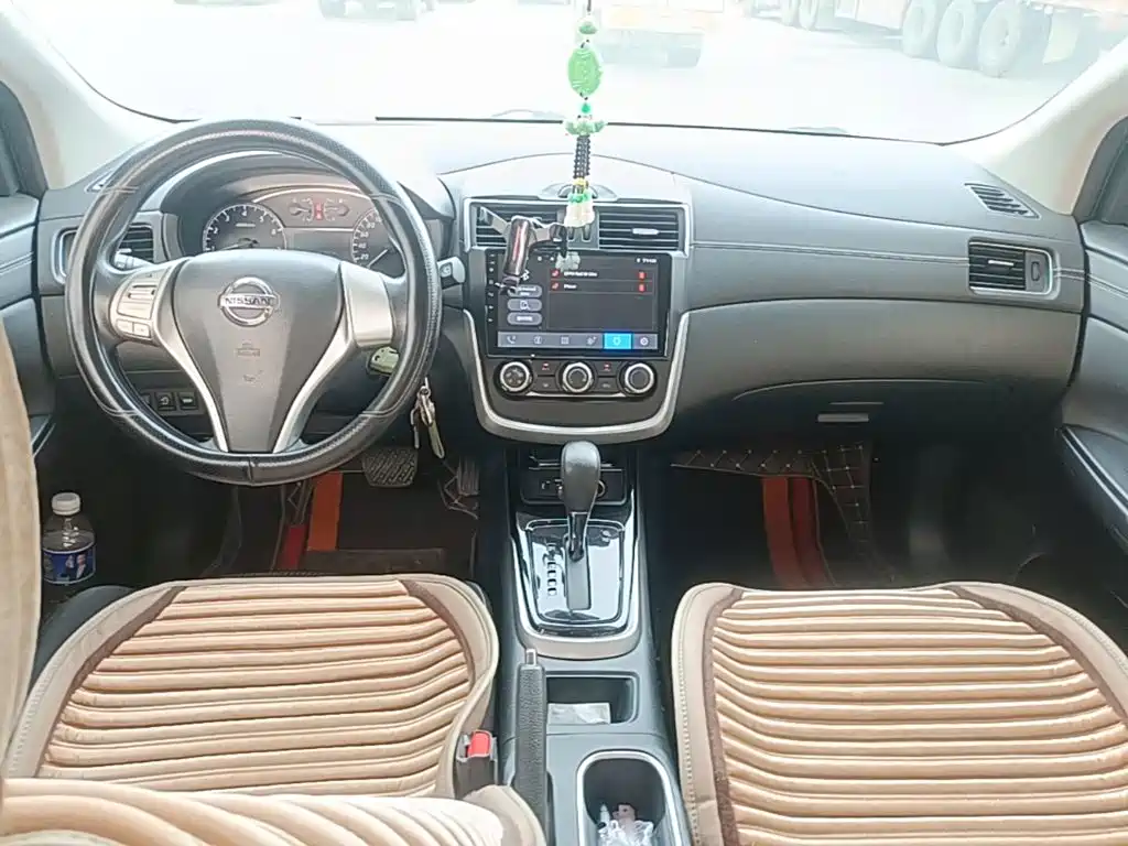 Nissan Tiida — фото 10