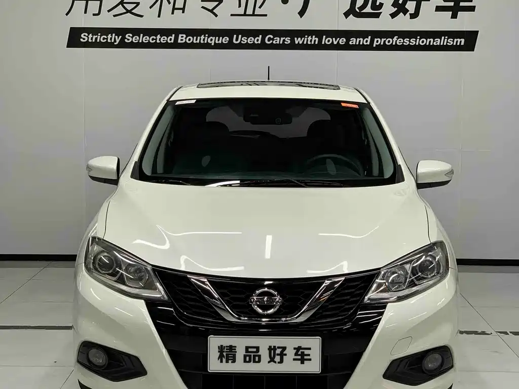 Nissan Tiida — фото 2