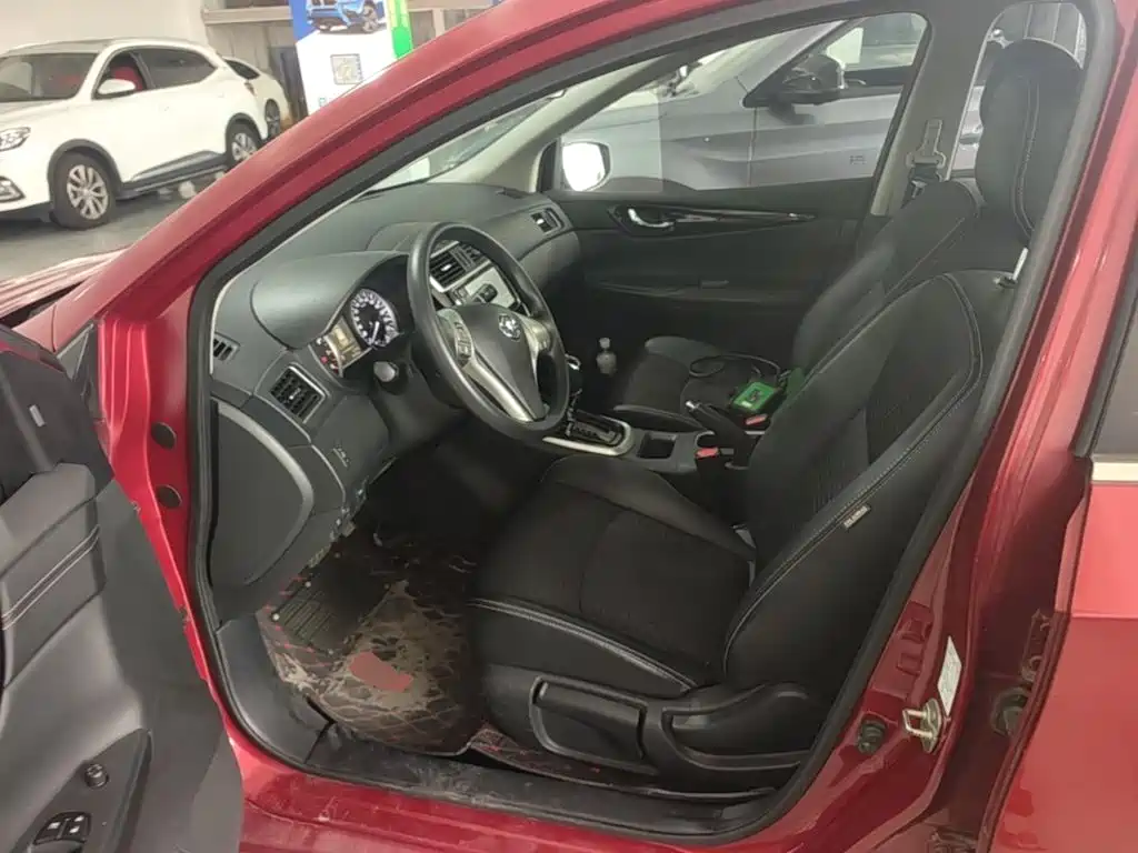 Nissan Tiida — фото 15