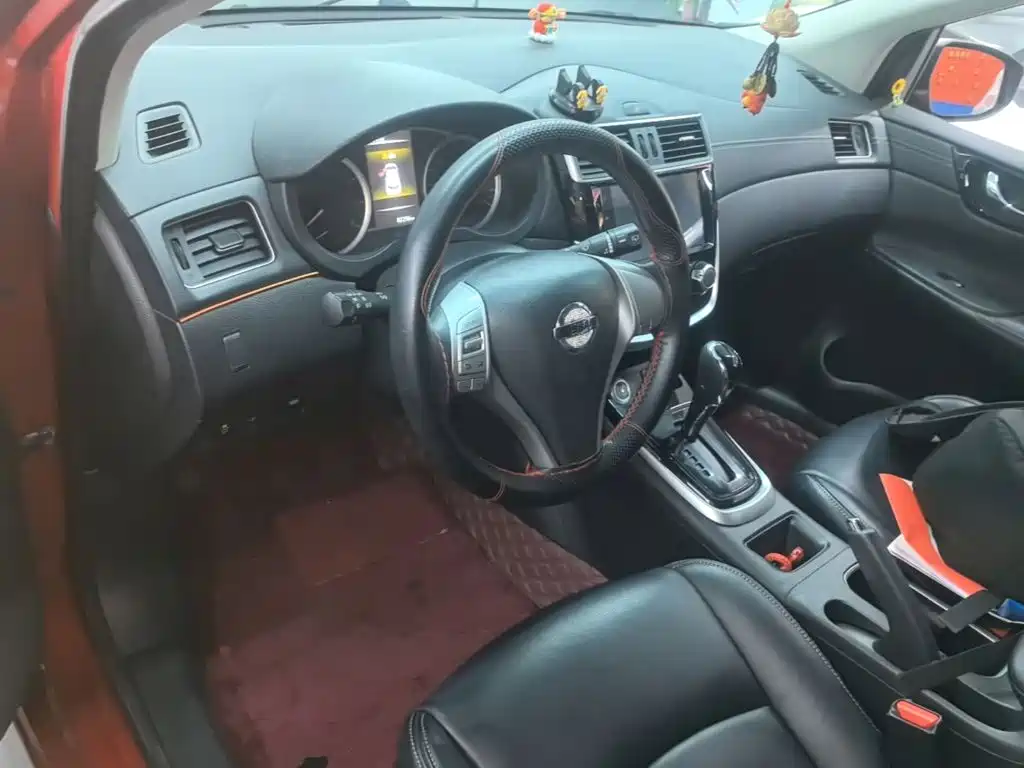 Nissan Tiida — фото 10