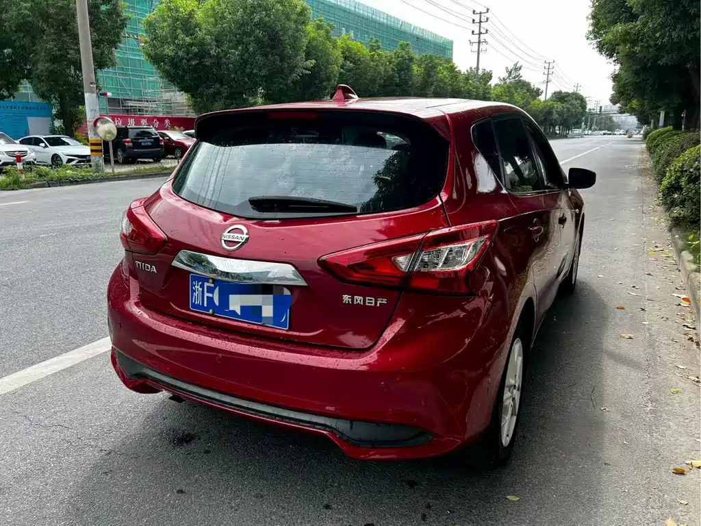 Nissan Tiida — фото 8