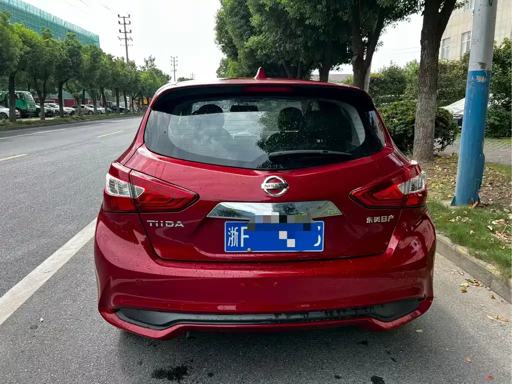 Nissan Tiida — фото 9