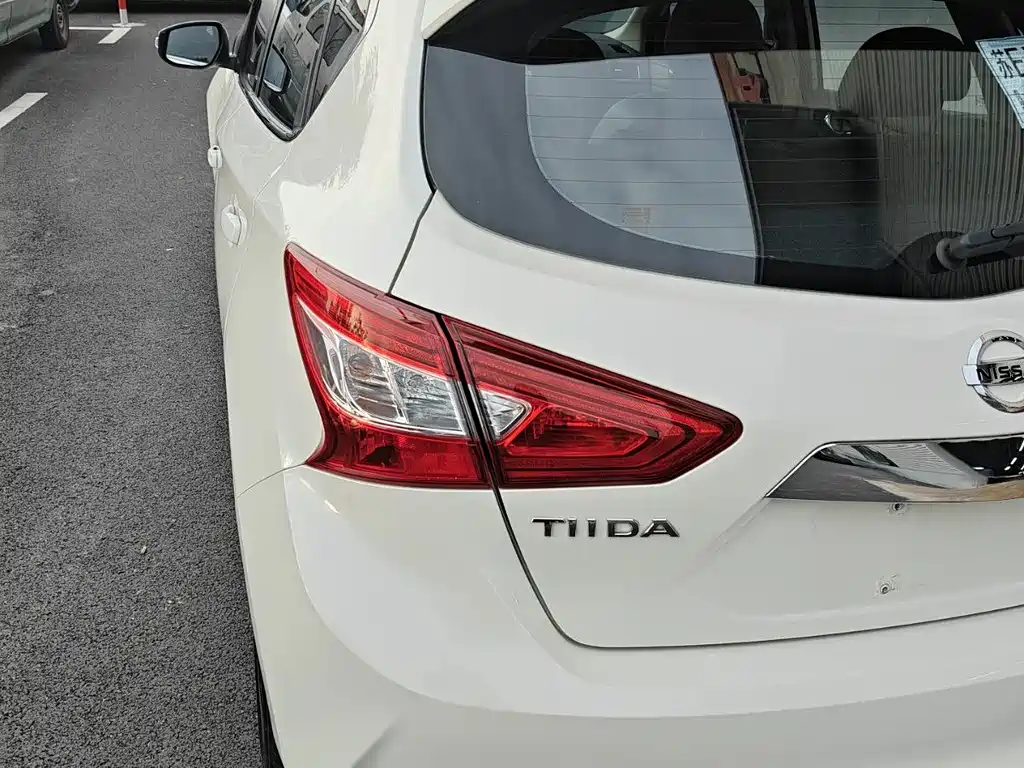 Nissan Tiida — фото 6