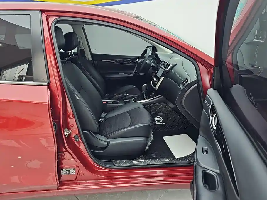 Nissan Tiida — фото 8