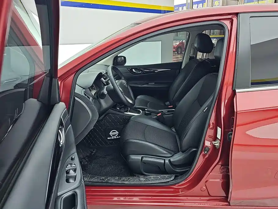 Nissan Tiida — фото 9