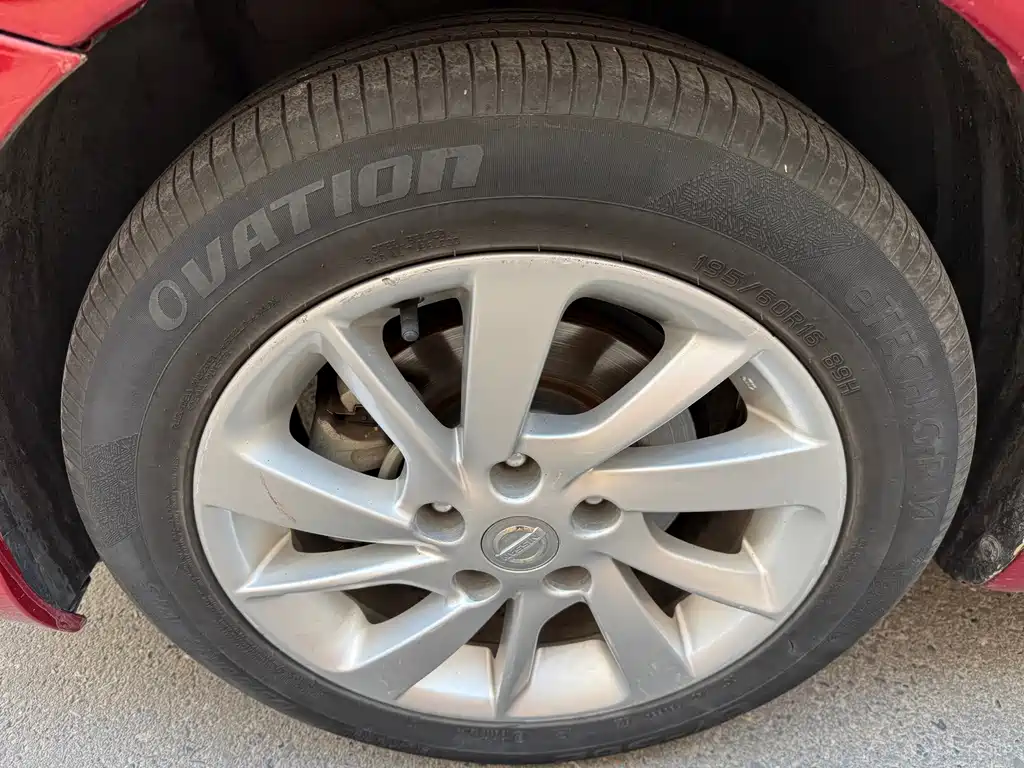 Nissan Tiida — фото 10