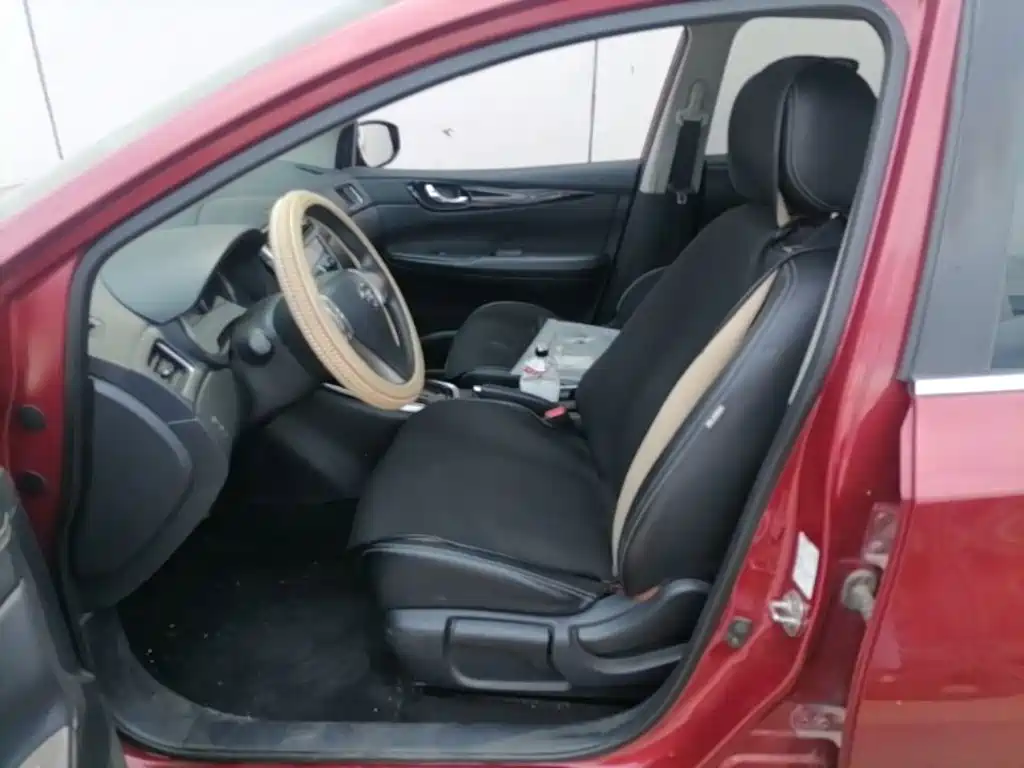 Nissan Tiida — фото 11