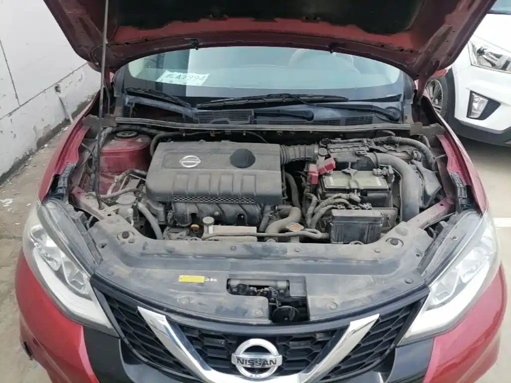 Nissan Tiida — фото 16