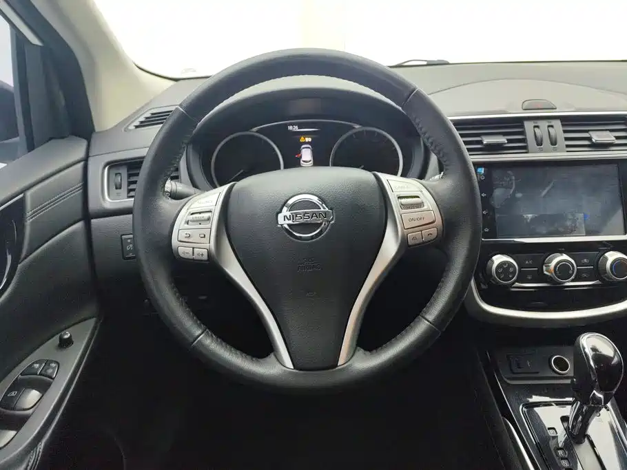 Nissan Tiida — фото 15