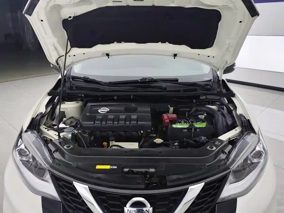 Nissan Tiida — фото 10