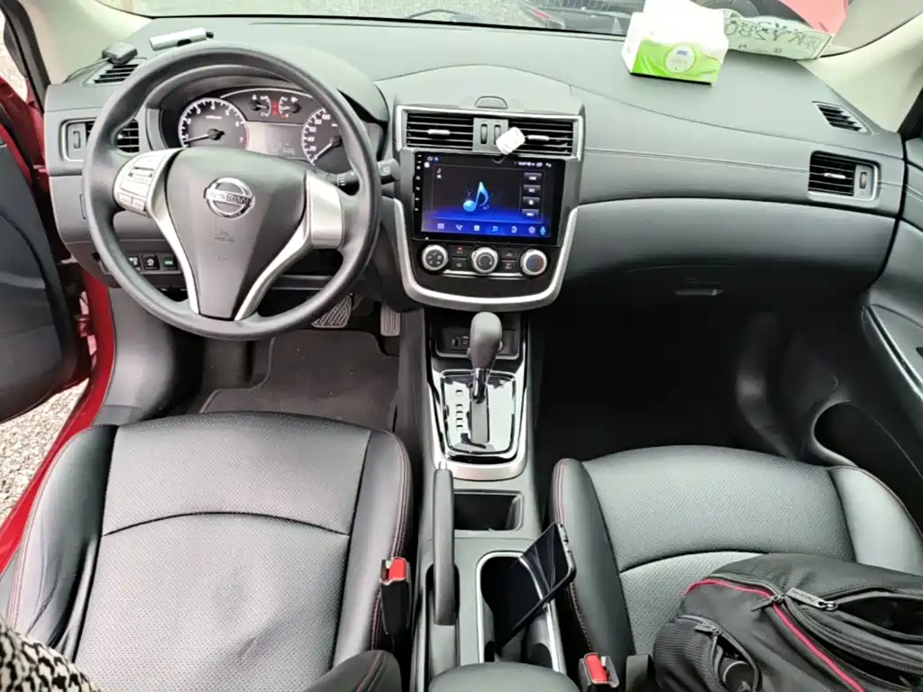 Nissan Tiida — фото 13