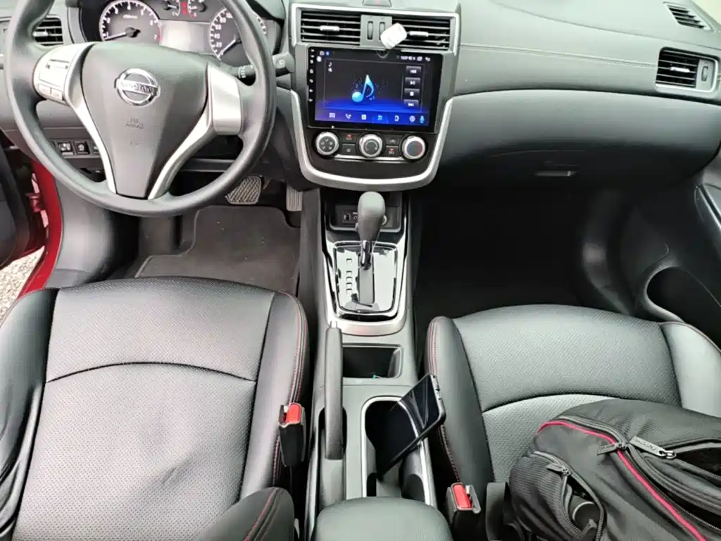 Nissan Tiida — фото 14