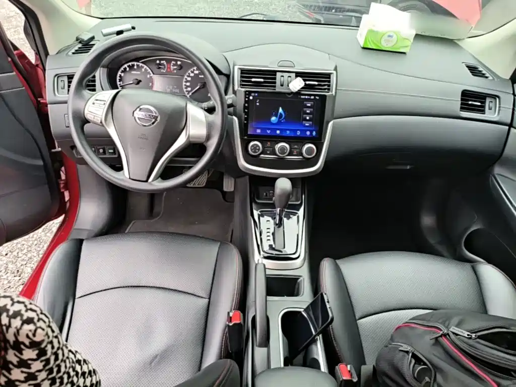 Nissan Tiida — фото 10
